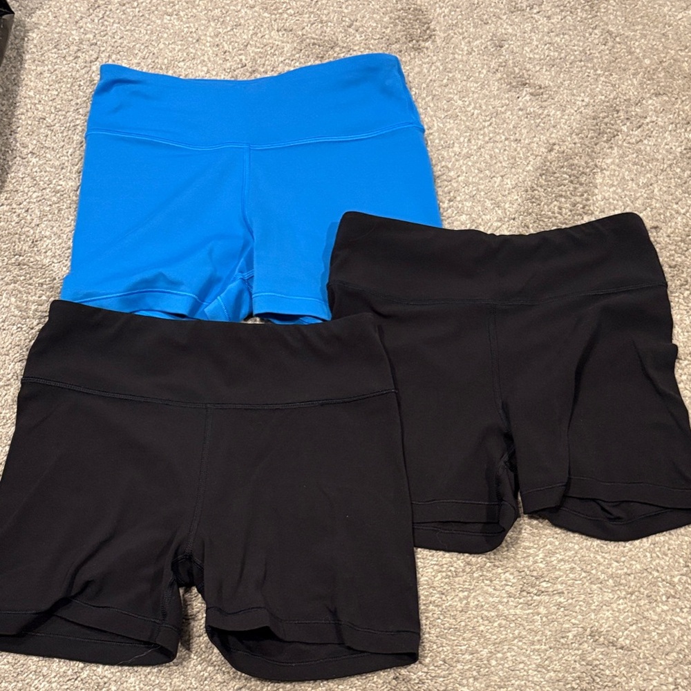 Girls Athleta 3 pairs of shorts 2 Black and 1 Blue size 12